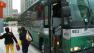 Passengers exit an AC Transit bus at the temporary Transbay Terminal in San Francisco