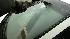 A San Mateo driver scrapes off ice from a...