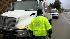 Storm causes potholes and downs trees in the... :: tow truck driver