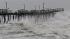 Waves from Hurricane Sandy crash onto the...