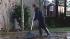 Russian River floods low-lying areas :: Woman cleans up after minor flooding from the Russian River