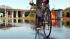 Residents, businesses prepare for Bicyclist tries to ride through King Tide flooding in the North Bay