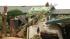 Storm-toppled tree crushes carport and cars in...