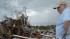 Monty Montgomery surveys the scene as he prepares to clean up a friends tornado-ravaged home Thursday, May 23, 2013, in Moore, Okla.