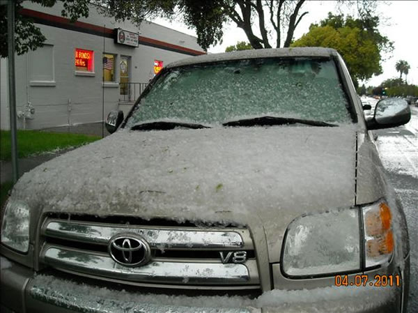 An isolated thunderstorm brings a mix of hail...