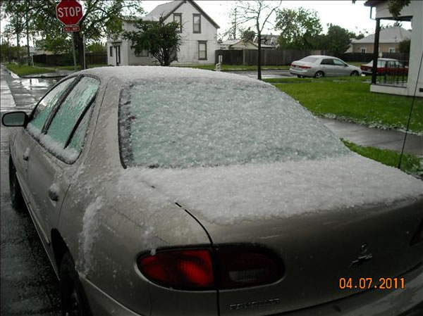An isolated thunderstorm brings a mix of hail...