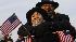 Pamela and Ronald Ingram wait cheerfully on the...