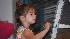 This tiny artist was putting the finishing...