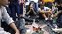 Musician Tyson Stevens, center, joins other fans...