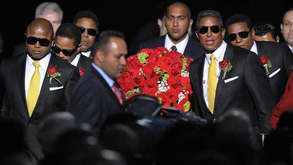 The Jackson Brothers accompany the casket into the memorial service for Michael Jackson at the Staples Center in Los Angeles, Tuesday, July 7, 2009. (AP Photo/Mark J. Terrill)