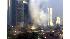 Smoke billows from J.W. Marriott hotel after an...