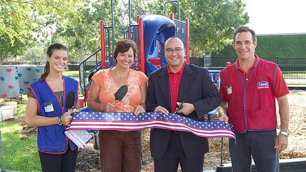 (From left) Lowes Sales Manager Ashley Hajek, former McWhirter PTA President Nan Turner, McWhirter Principal Dr. Michael Marquez and Paul Marshall, Lowes Commercial Sales Specialist