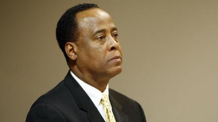 In this Nov. 16, 2009 file photo, Dr. Conrad Murray, a physician for the late pop star Michael Jackson, appears at a child support hearing at Clark County Family Court in Las Vegas. Edward Chernoff, a lawyer for Murray, says the doctor is returning to work at his Houston clinic on Monday Nov. 23, 2009. (AP Photo/Isaac Brekken, Pool, File)