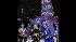 Families and revelers came out to light up the...