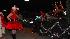 Families and revelers came out to light up the...