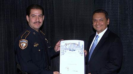 The proclamation was for December 10, 2009 to be Sheriff Adrian Garcia Day. It was presented Thursday by Council Member Edward Gonzalez (right)