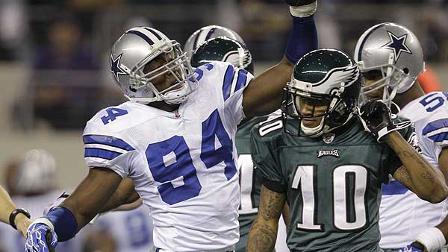 Dallas Cowboys linebacker DeMarcus Ware (94) celebrates a Cowboys fumble recovery in front of Philadelphia Eagles wide receiver DeSean Jackson (10) in the first half an NFL wild-card playoff football game, Saturday, Jan. 9, 2010, in Arlington, Texas. (AP Photo/David J. Phillip)