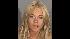 Lindsay Lohan, seen here in a booking mug...