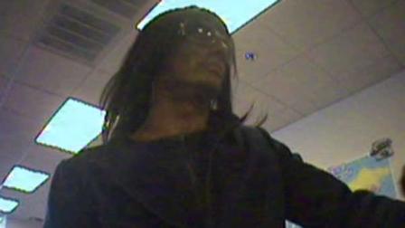 Police say the man was wearing a wig and possibly makeup