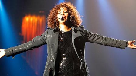 U.S. singer Whitney Houston performs at Saitama Arena in Saitama, near Tokyo, Japan, Thursday, Feb. 11, 2010. Houston died Saturday, February 11, 2012 at age 48. (AP Photo/Shizuo Kambayashi)