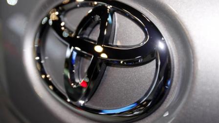 In this March 31, 2010 file photo, the Toyota logo is seen on a car displayed at the New York International Auto Show in New York. (AP Photo/Seth Wenig, File)