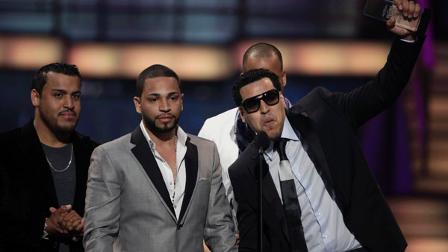 Members of the Latin musical group Aventura collect a Billboard Award for Tropical Album Group of the Year, at the 2010 Billboard Latin Music Awards, in San Juan, Puerto Rico, Thursday April 29, 2010. (AP Photo/Ricky Arduengo)