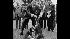 U.S. President Lyndon B. Johnson holds his dog...