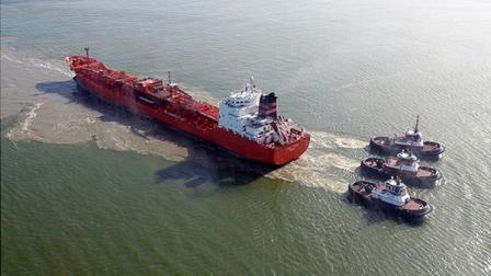 The Coast Guard is working to free a tanker that ran aground in the Houston Ship Channel. (Photo Credit: U.S. Coast Guard)