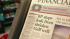 A newspaper is seen at a newsagent in central...