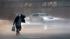 Pedestrians run along Broadway in the Upper West...