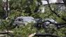 Cars are covered in debris after a severe storm moved through the area Thursday, Sept. 16, 2010, in the Queens borough of New York. (AP Photo/Daniel P. Derella)