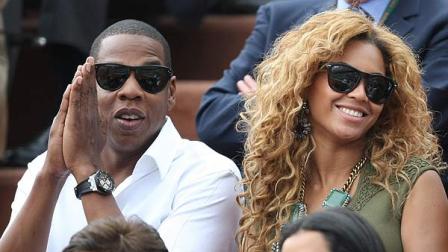 Singers Jay-Z and Beyonce watch Spains Rafael Nadal playing Swedens Robin Soderling during the mens final match of the French Open tennis tournament at the Roland Garros stadium in Paris, Sunday, June 6, 2010. (AP Photo/Lionel Cironneau)