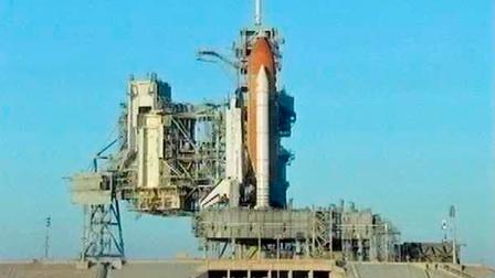This image provided by NASA TV shows the space shuttle Discovery on the launch pad at Kennedy Space Center Friday morning Dec. 17, 2010 as a tanking test begins. Teams will fill the spacecrafts external fuel tank with liquid hydrogen and liquid oxygen just as they do during a launch attempt to verify repairs made to the tank. Technicians added 89 sensors to the outside of the tank recently including strain gauges to gather precise measurements of how much the tank moves during the fueling process. (AP Photo/NASA)