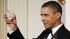 President Barack Obama offers a toast as he and...