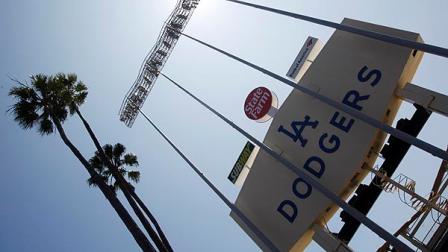 In this June 20, 2011 photo, the back side of the right-field scoreboard at Dodger Stadium, home of the Los Angeles Dodgers, is seen in Los Angeles. On Monday, June 27, 2011, the Los Angeles Dodgers filed for bankruptcy protection in a Delaware court. Dodgers owner Frank McCourt cites Major League Baseball commissioner Bud Seligs interference with club operations and refusal to approve a Dodgers TV deal with Fox Sports as the cause for Mondays bankruptcy filing. (AP Photo/Reed Saxon)
