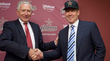 In this file photo, Houston Astros owner Drayton McLane, left, and Jim Crane, right, after a news conference to announce McLane is selling the baseball team to a group led by Crane, pending approval from Major League Baseball, Monday, May 16, 2011, in Houston. (AP Photo/David J. Phillip)