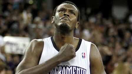 In this file photo, Sacramento Kings center Samuel Dalembert pounds his chest after scoring against the Los Angeles Lakers in the final moments of regulation play, in a NBA basketball game in Sacramento, Calif., Wednesday, April 13, 2011. (AP Photo/Rich Pedroncelli)
