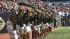 Images of fans, cheerleaders, players and the...