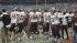 Images of fans, cheerleaders, players and the...