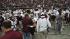 Images of fans, cheerleaders, players and the...