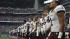 Images of fans, cheerleaders, players and the...
