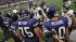 Images of fans, cheerleaders, players and the...