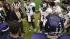 Images of fans, cheerleaders, players and the...