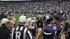 Images of fans, cheerleaders, players and the...