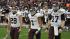 Images of fans, cheerleaders, players and the...