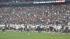 Images of fans, cheerleaders, players and the...