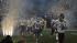 Images of fans, cheerleaders, players and the...