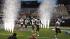 Images of fans, cheerleaders, players and the...