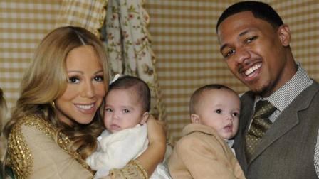 , left, poses with singer Maria...