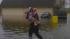 Firefighter carries child to safety from... ::